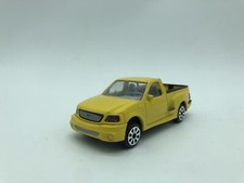 MODELLINO AUTO FORD STV F150 SVT PICK UP GIALLO - BURAGO - SCALA 1:43 "NO BOX"