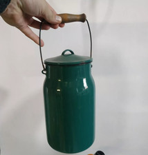 Vintage green enamel milk can