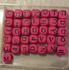 Perline legno fucsia con