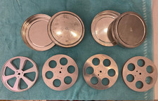 Film 16mm. Set di due contenitori in metallo con quattro bobine complessive.