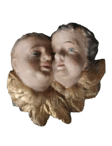 Antiche teste cherubini