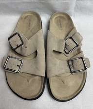 Sandali piatti in pelle con