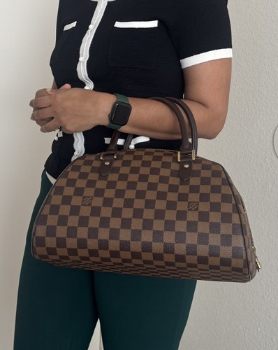 Louis vuitton damier - louis, ebene