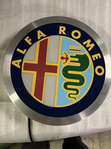 Insegna luminosa tonda - tonda, alfa