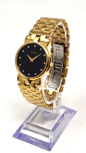 Leggi orologio rotondo gucci - -,