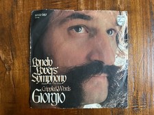 Giorgio = Giorgio Moroder -