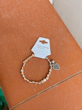 Bracciale in metallo con charm