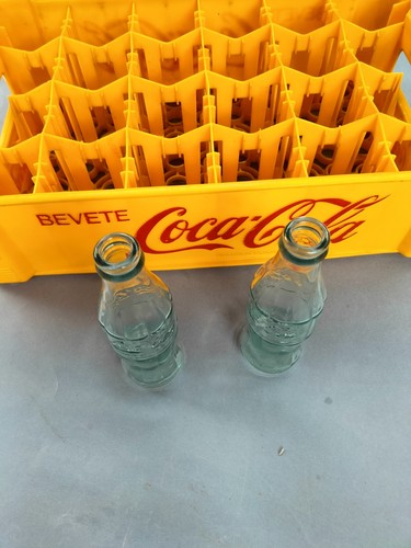 Coca cola porta - cola, bottiglie