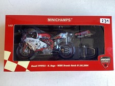 Minichamps modello 1:12 Ducati 999F03 N.Haga WSBK Brands Hatch 2004 IMBALLO ORIGINALE nuovo!
