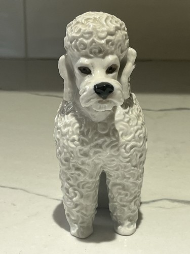 Antica statuina cane