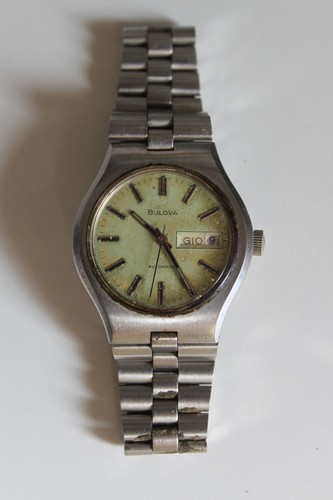 Bulova day date automatic anni - date,