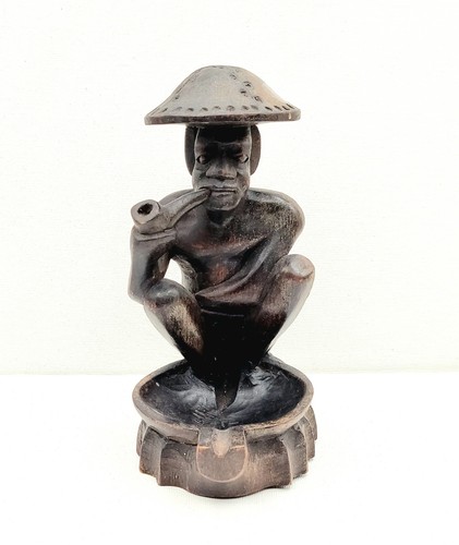 Scultura legno intagliato a - in,
