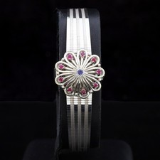 Omega lady 60s 18 kt white gold jewel watch with sapphire and rubies serviced