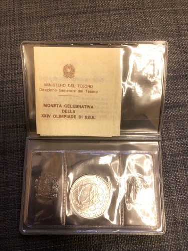 Moneta celebrativa della xxiv - moneta,