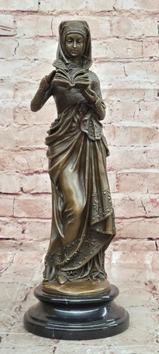 Scultura lettura signora - da,