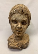 Scultura testa di bambino in