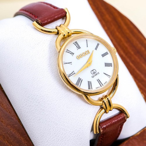 Gucci 6000 gold leather - gucci,
