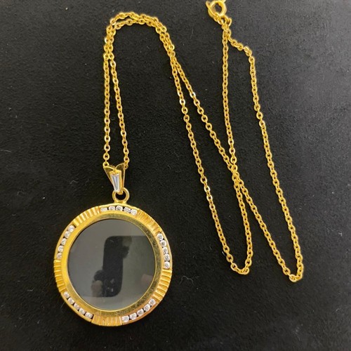 Collana vintage con - , lente