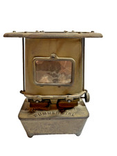 Antico riscaldatore in ferro