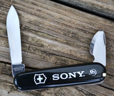 Victorinox Swiss Army orologio apri cassa e coltello nero multiutensile logo Sony - ottimo