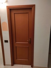 Set di 7 porte interne color noce con cornice 