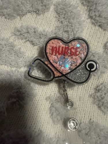 Clip porta badge retrattile