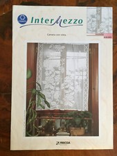 Schema tenda a filet motivo floreale Uncinetto Coats Freccia