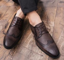 Scarpe a punta stringate