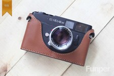 Custodia mezza fotocamera in