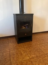 stufa a legna in ghisa usata