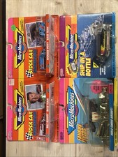 Lotto di quattro micro macchine nuove. Stock auto volantini famosi spedizione in bottiglia.