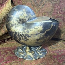Scultura metallo conchiglia