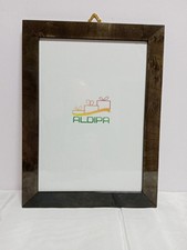 Cornice in radica con vetro