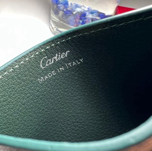 Cartier must green - de,