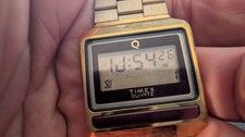 Vintage Timex S-Cell digitale quarzo tono oro LCD retrò logo Q anni 70/80