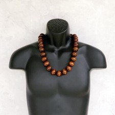 Collana di perle in legno per