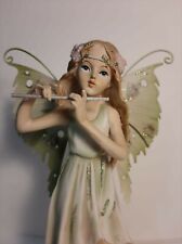 Statua Fata che suona il flauto traverso. Decorazione. Verde.