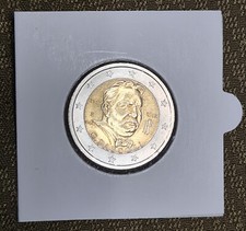 ITALIA 2012 PASCOLI MONETA 2 EURO NUOVA FDC in cartina quadrata con Oblo trasp.