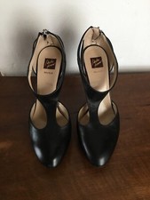 L’Autre Femme Made in Italy scarpe in vera pelle nera con tacco 12 e plateau.