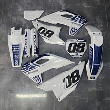 Plastiche + Grafica Husqvarna