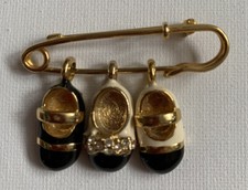 Spilla per pannolini tono oro