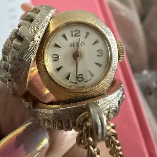 Collana con ciondolo orologio