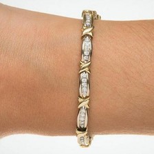 2.CT Bracciale tennis con collegamento a "X" con diamante rotondo simulato...