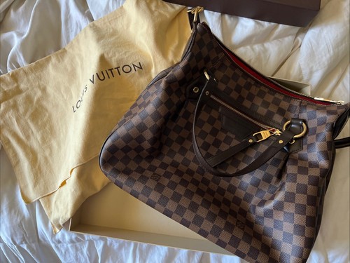 Authentic louis vuitton evora - louis,