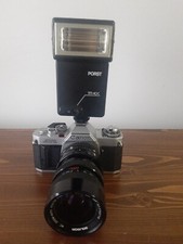 MACCHINA FOTOGRAFICA CANON AV-1 CON FLASH PORST TM 40 C