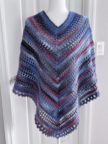 Poncho nuovo fatto - , mano