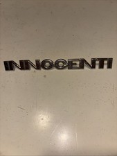 Innocenti Badge Scritta Logo