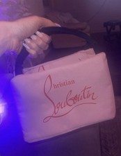 Campione profumo + sacchetto trucco Christian Louboutin sacchetto isolato rosa rosso