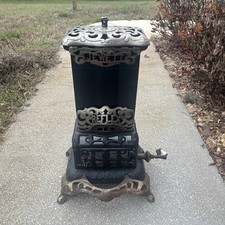 ANTICA STUFA A GAS IN GHISA