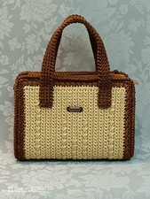 Borse donna lavorate a